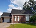Woning met kunststof dakgoten